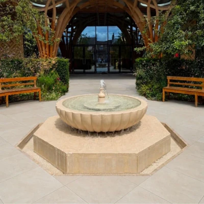 Restored limestone fountain in the courtyard at Cambridge Central Mosque